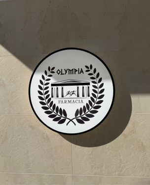 logotipo fachada farmacia olympia
